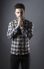 Caucasian boy isolated on grey background