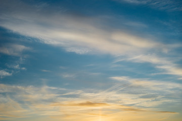 Surreal cirrus clouds on blue sky