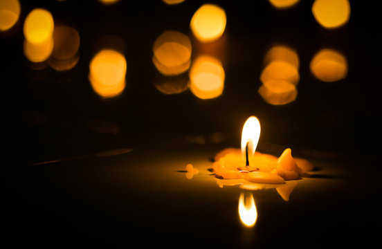 light a candle in the dark