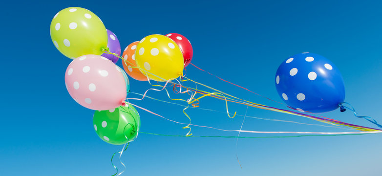 Balloons against the blue sky