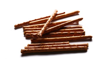 salty cracker pretzel sticks isolated on white background