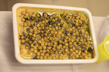 Hummus on a rustic wooden table