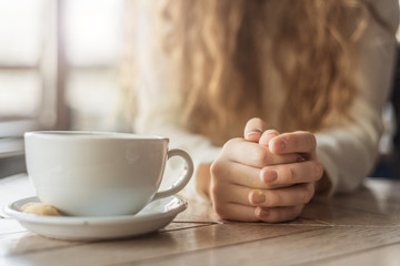 Woman drinking teain cafe