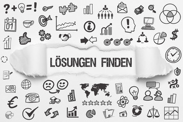 Lösungen finden / weißes Papier mit Symbole