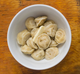 Homemade Meat Dumplings or Russian Pelmeni with Butter