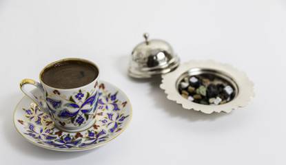 Turkish Coffee with small chocolate with authentic cup