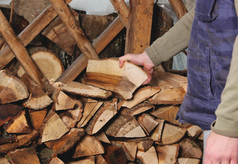 Man holding firewood
