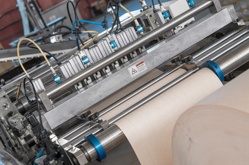 machines and equipment for processing cardboard and paper for car filters