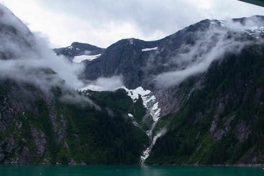 Picture of the Alaskan Fjords, with snowy valleys