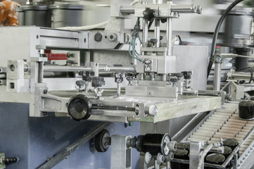machines and equipment on a conveyor belt assembly automotive filters