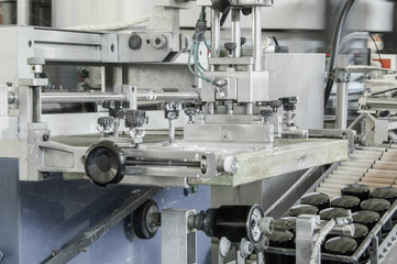 machines and equipment on a conveyor belt assembly automotive filters