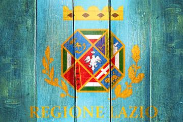 Obraz premium Vintage Lazio flag on grunge wooden panel