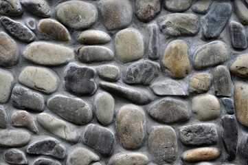 Фон і текстура з брил натурального каменю на вертикальній стіні