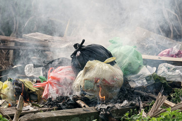 Plastic waste and rubbish open burning