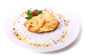 Fried meat covered with cheese and eggs