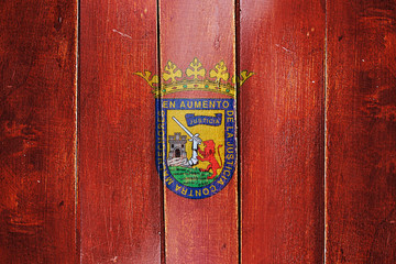 Vintage Alava flag on grunge wooden panel