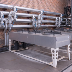 Air cooled condenser with pipework