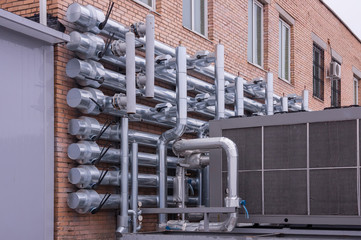 Air cooled water chiller with pipework