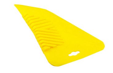 Yellow Spatula for gluing wallpaper