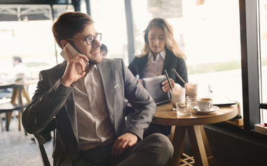 Business people talking and laughing together