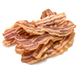 cooked crispy slices of bacon isolated on white background