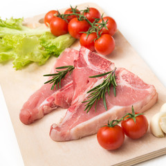 Fresh beef steaks with vegetables