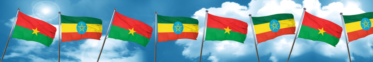 Burkina Faso flag with Ethiopia flag, 3D rendering