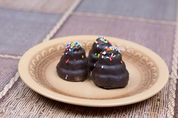 Chocolate cup cake on the plate