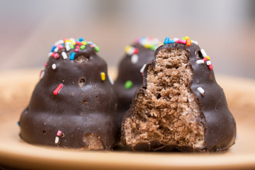Chocolate cream cakes on the plate