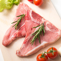 Fresh beef steaks with vegetables