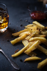 French fries on dark background
