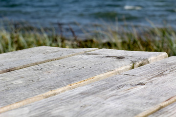 Wooden table by the sea