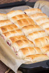 Baked puff pastry with cherry cream in the baking tray