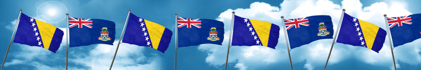 Bosnia and Herzegovina flag with Cayman islands flag, 3D renderi