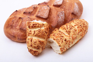 assorted breads isolated on a white background.