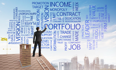 Young businessman standing on house roof and writing leadership skill concept. Mixed media