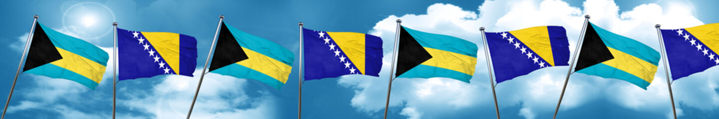 Bahamas flag with Bosnia and Herzegovina flag, 3D rendering