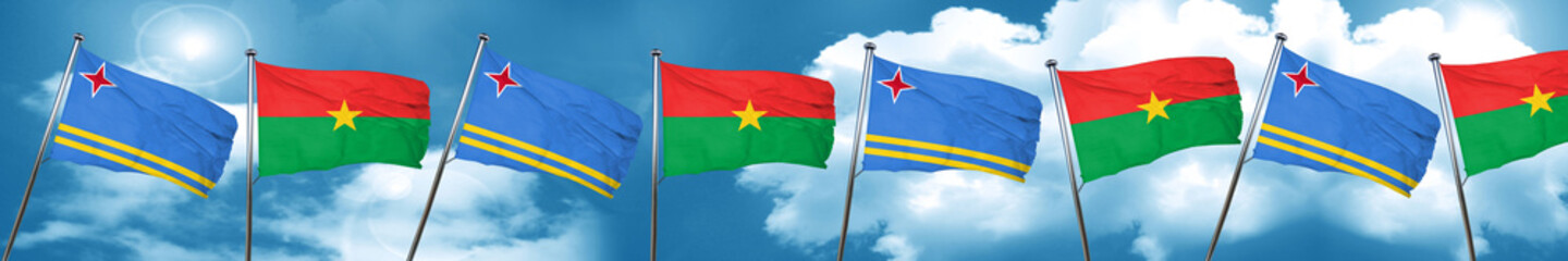 aruba flag with Burkina Faso flag, 3D rendering