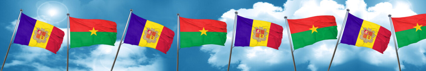 Andorra flag with Burkina Faso flag, 3D rendering