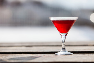 Red cocktail in the glass