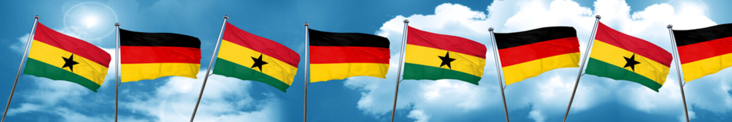 Ghana flag with Germany flag, 3D rendering