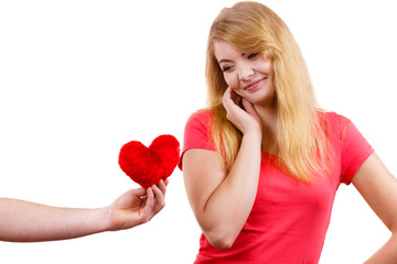 Couple in love. Man giving woman red heart