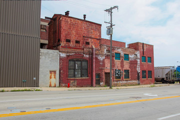 Naklejka premium Red Fabric Building with Train