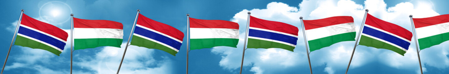 Gambia flag with Hungary flag, 3D rendering