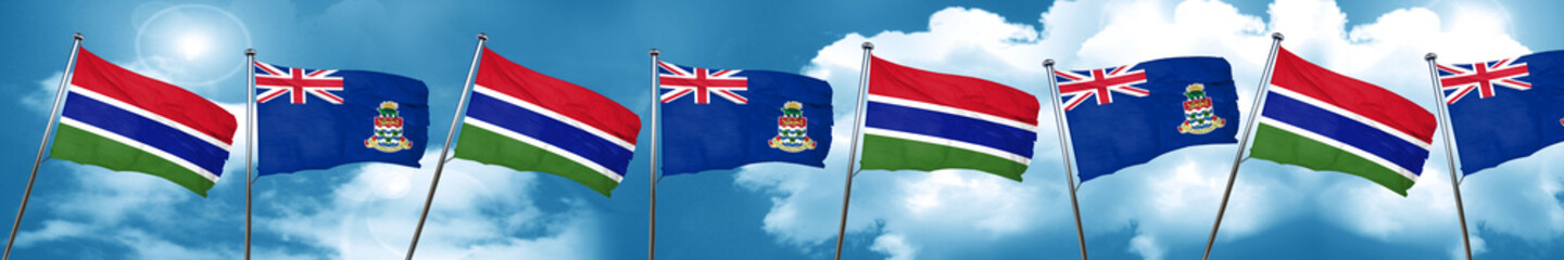 Gambia flag with Cayman islands flag, 3D rendering