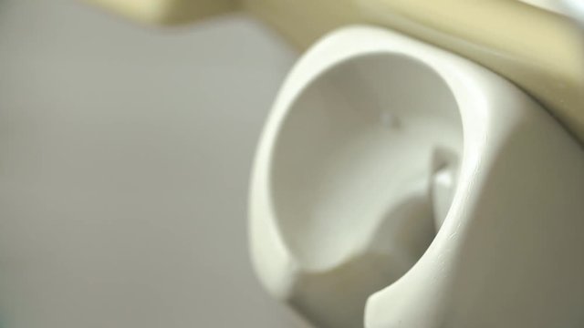 Dental office. Equipment of dentist, tools, medical instruments. The hand doctor uses dental instruments . Health concept.