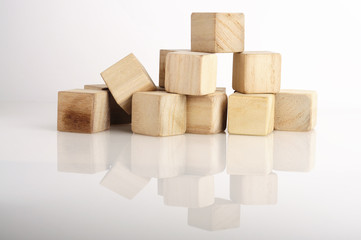 Reflection of Wooden Block on White Background