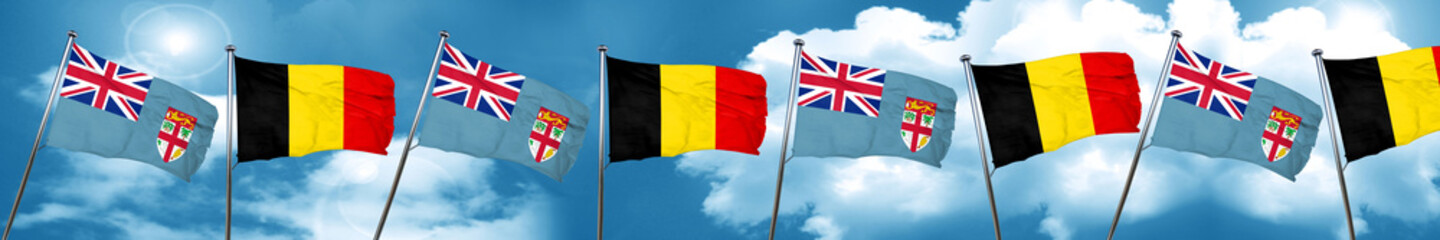 Fiji flag with Belgium flag, 3D rendering