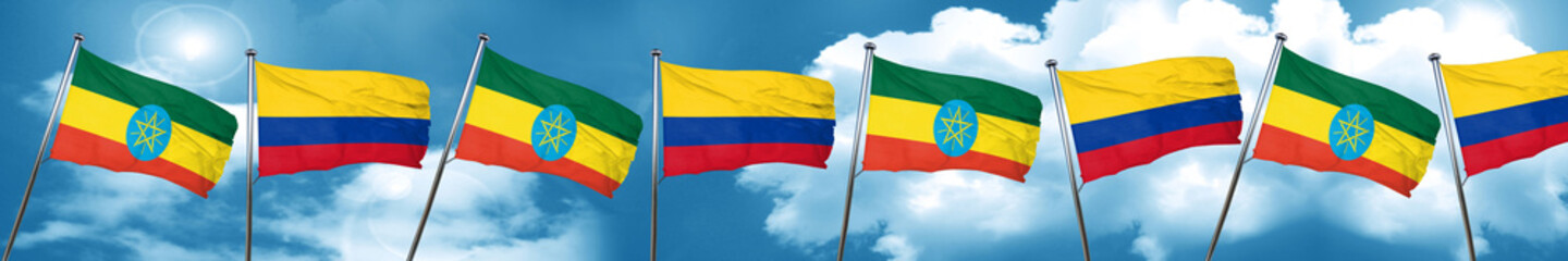 Ethiopia flag with Colombia flag, 3D rendering