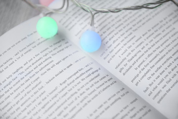 Close up view of book and beautiful garland